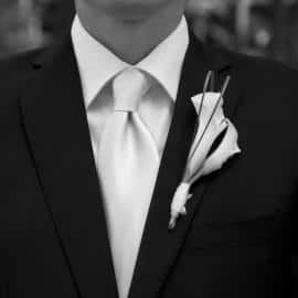 Wedding groom with corsage